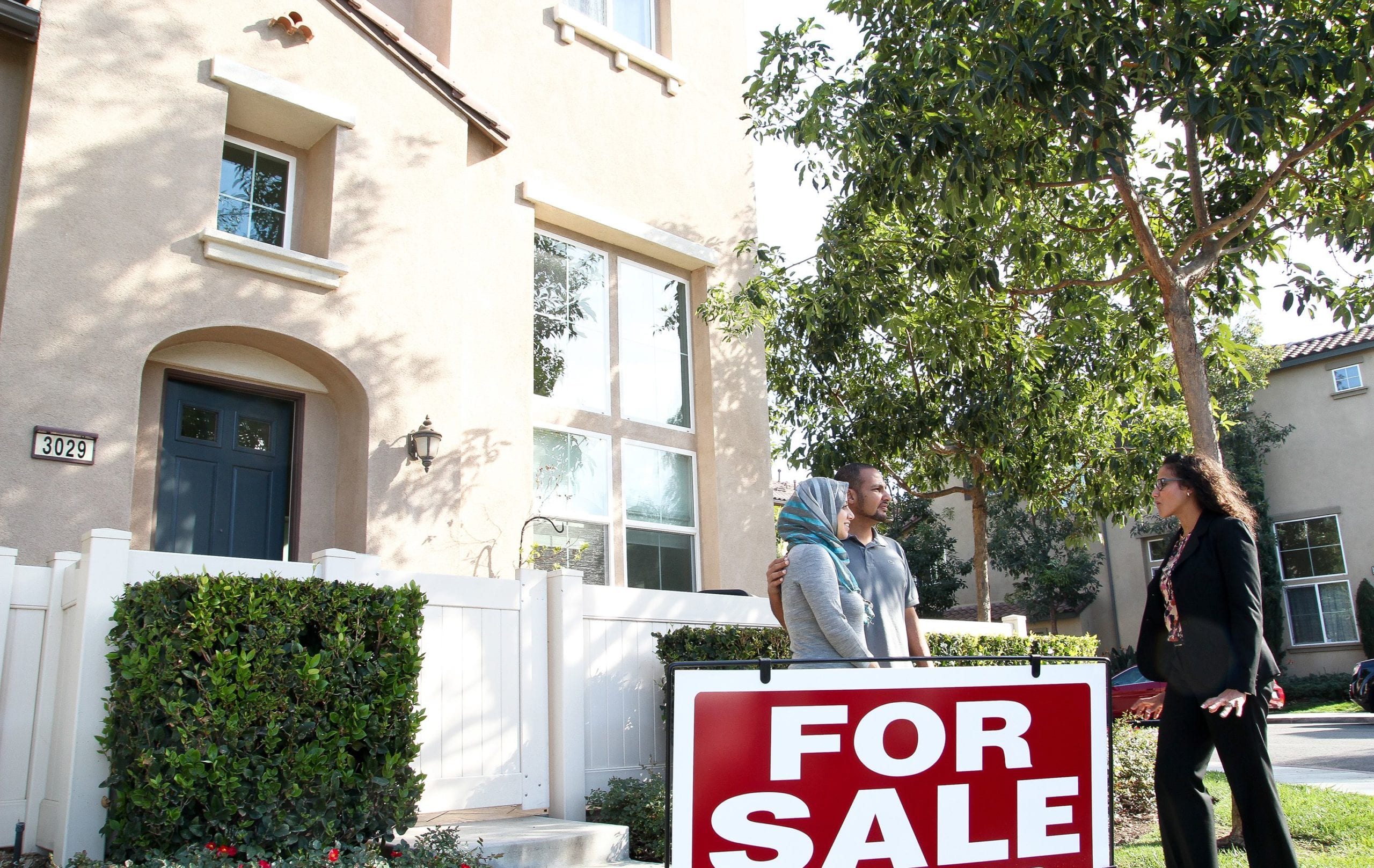 house with for sale sign